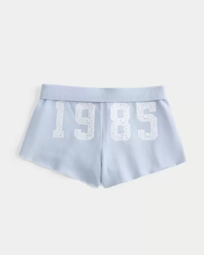 Mini pantaloncini in pile con grafica in pizzo Mini pantaloncini in pile con grafica in pizzo