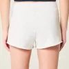 Mini pantaloncini in pile con grafica numerica Mini pantaloncini in pile con grafica numerica
