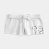 Mini pantaloncini in pile con grafica numerica Mini pantaloncini in pile con grafica numerica