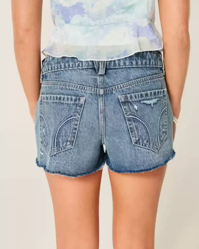 Mini shorts in denim a vita bassa effetto used lavaggio medio