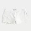 Mini shorts in denim bianco effetto consumato a vita bassa