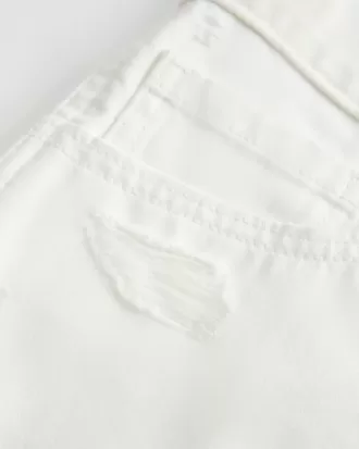 Mini shorts in denim bianco effetto consumato a vita bassa