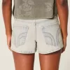 Mini shorts in denim chiaro a vita bassa