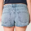 Mini shorts in denim lavaggio chiaro a vita bassissima Mini shorts in denim lavaggio chiaro a vita bassissima