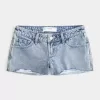 Mini shorts in denim lavaggio chiaro a vita bassissima Mini shorts in denim lavaggio chiaro a vita bassissima
