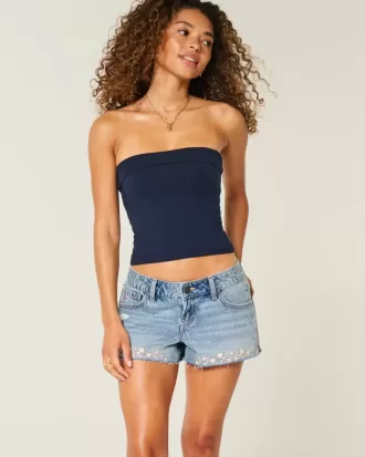 Mini shorts in denim ricamati a vita bassissima