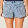 Mini shorts in denim ricamati a vita bassissima Mini shorts in denim ricamati a vita bassissima