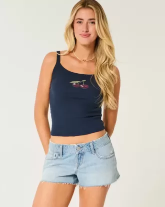 Mini shorts in denim strappati a vita bassa e lavaggio medio