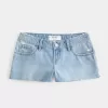 Mini shorts in denim strappati a vita bassa e lavaggio medio Mini shorts in denim strappati a vita bassa e lavaggio medio