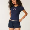 Mini shorts in pile con grafica a fiocco Mini shorts in pile con grafica a fiocco