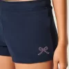 Mini shorts in pile con grafica a fiocco Mini shorts in pile con grafica a fiocco