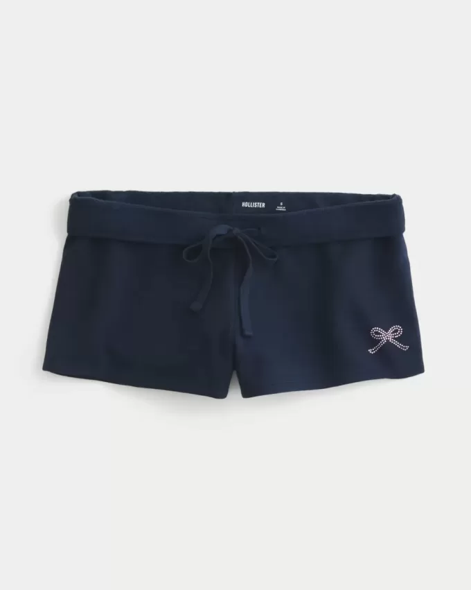 Mini shorts in pile con grafica a fiocco Mini shorts in pile con grafica a fiocco