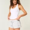 Mini shorts in pile con grafica a stella Mini shorts in pile con grafica a stella