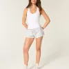 Mini shorts in pile con grafica a stella Mini shorts in pile con grafica a stella