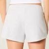 Mini shorts in pile con grafica a stella Mini shorts in pile con grafica a stella