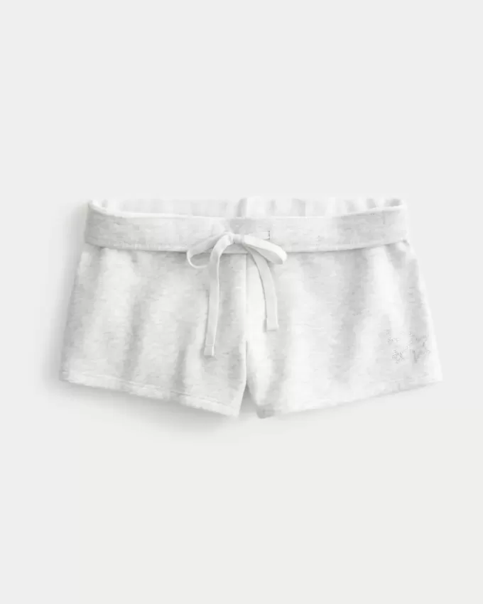 Mini shorts in pile con grafica a stella Mini shorts in pile con grafica a stella