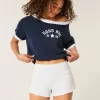 Mini shorts in pile con strisce laterali