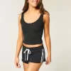 Mini shorts in pile con strisce laterali