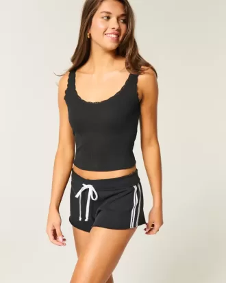 Mini shorts in pile con strisce laterali