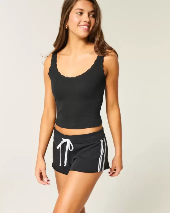 Mini shorts in pile con strisce laterali
