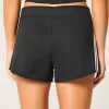 Mini shorts in pile con strisce laterali