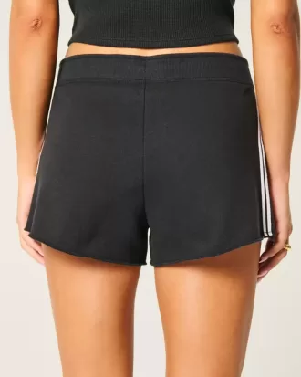 Mini shorts in pile con strisce laterali