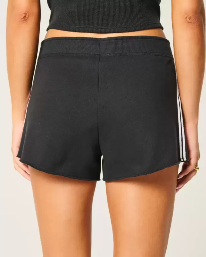 Mini shorts in pile con strisce laterali
