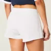 Mini shorts in pile con strisce laterali