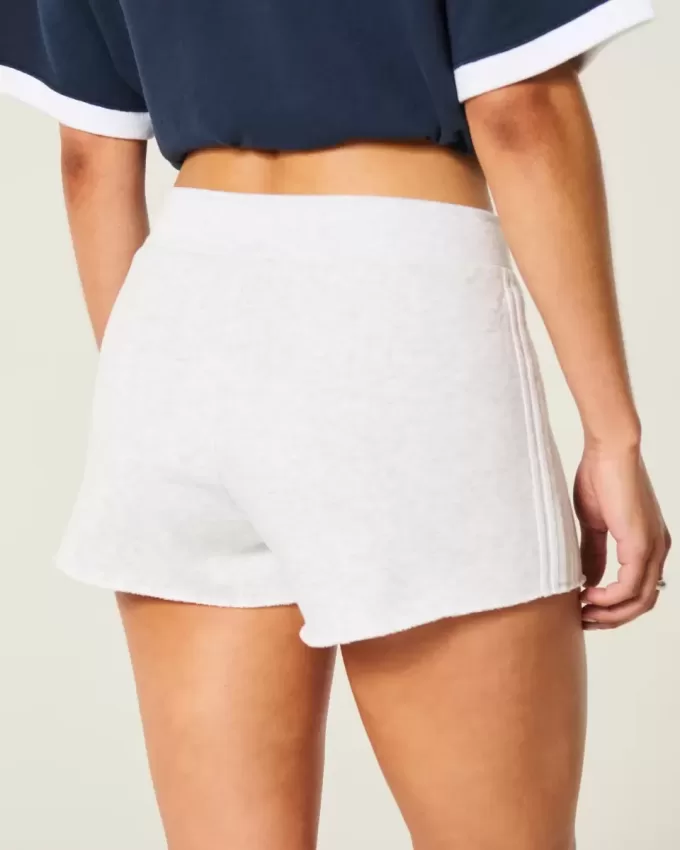 Mini shorts in pile con strisce laterali