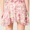 Minigonna in chiffon con orlo asimmetrico