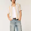 Pantaloncini cargo in denim super larghi con lavaggio medio
