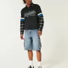 Pantaloncini cargo in denim super larghi con lavaggio medio