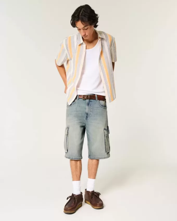 Pantaloncini cargo in denim super larghi con lavaggio medio