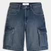 Pantaloncini cargo in denim super larghi con lavaggio medio