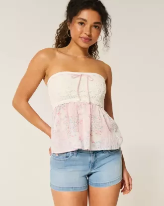 Pantaloncini corti in denim a vita bassa con ricamo floreale e lavaggio chiaro