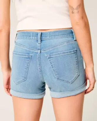 Pantaloncini corti in denim strappato a vita alta e lavaggio medio chiaro