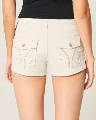 Pantaloncini corti in popeline a vita bassa con tasche posteriori e stampa floreale