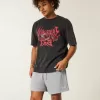Pantaloncini da calcio con logo in maglia a metà coscia