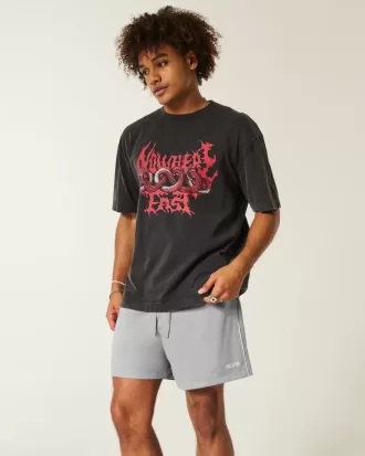 Pantaloncini da calcio con logo in maglia a metà coscia