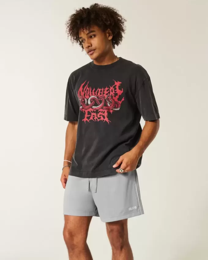 Pantaloncini da calcio con logo in maglia a metà coscia