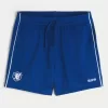 Pantaloncini da calcio con logo in maglia a metà coscia