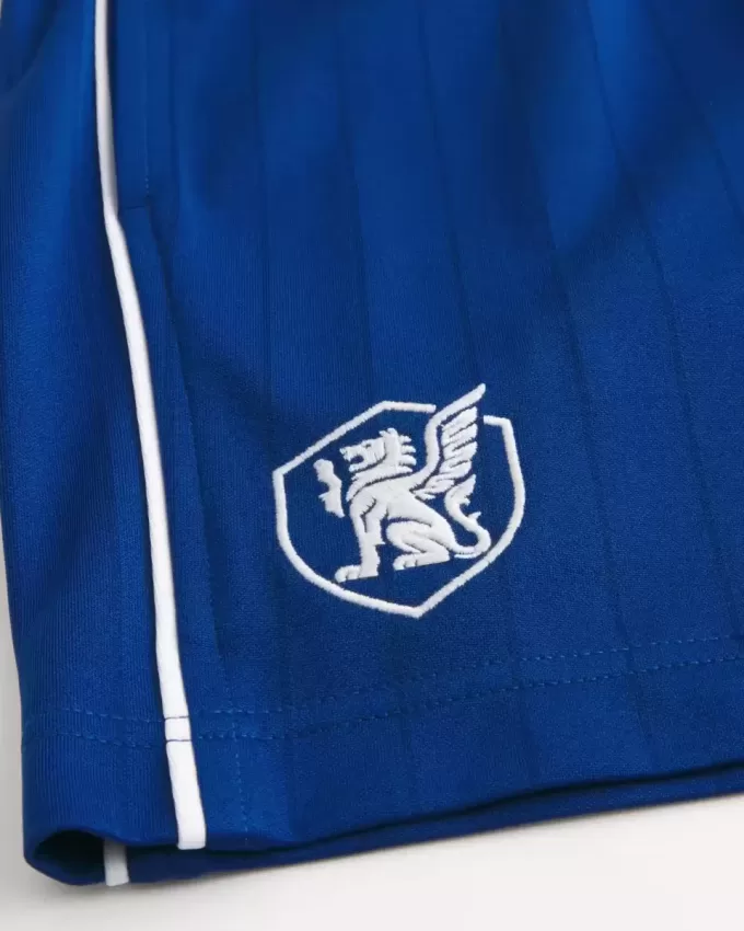 Pantaloncini da calcio con logo in maglia a metà coscia