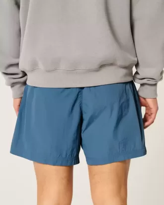 Pantaloncini da calcio larghi a metà coscia