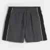 Pantaloncini da calcio larghi a metà coscia