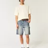 Pantaloncini da pittore in denim larghi con lavaggio medio