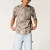 Pantaloncini da pittore in denim larghi e lavaggio chiaro