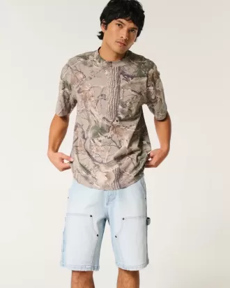 Pantaloncini da pittore in denim larghi e lavaggio chiaro