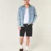 Pantaloncini di jeans larghi sopra il ginocchio