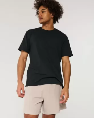 Pantaloncini ibridi attivi a metà coscia