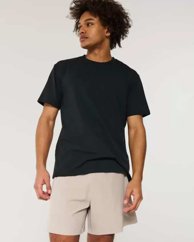 Pantaloncini ibridi attivi a metà coscia